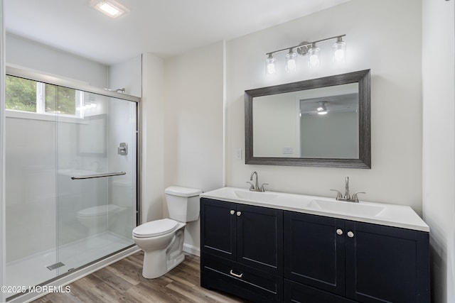 21 Turnbridge, Manchester, NJ 08759 - full bath with toilet, double vanity, a stall shower, and wood finished floors