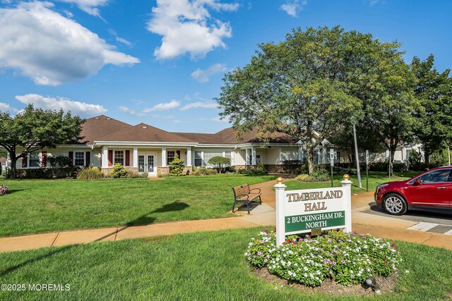 21 Turnbridge, Manchester, NJ 08759 - view of front facade featuring french doors and a front lawn