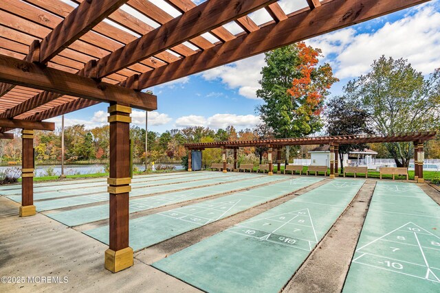 21 Turnbridge, Manchester, NJ 08759 - view of home's community with a pergola, a water view, and shuffleboard