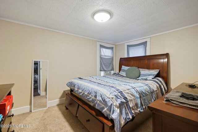 1952 Stratford Ave, Neptune Township, NJ 07753 - bedroom with light colored carpet, crown molding, and baseboards