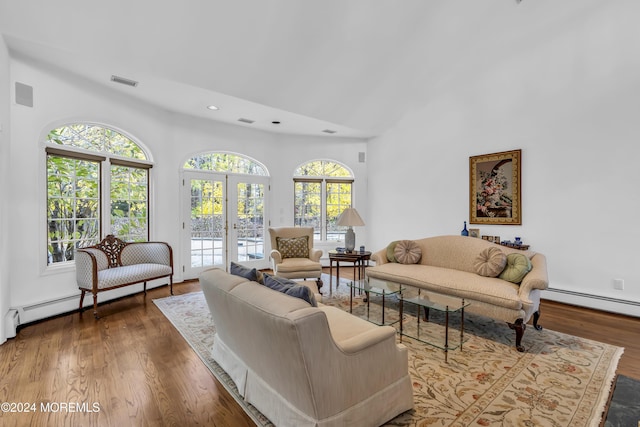 34 Bruns Rd, West Allenhurst, NJ 07711 - living room featuring a baseboard radiator, recessed lighting, wood finished floors, high vaulted ceiling, and french doors