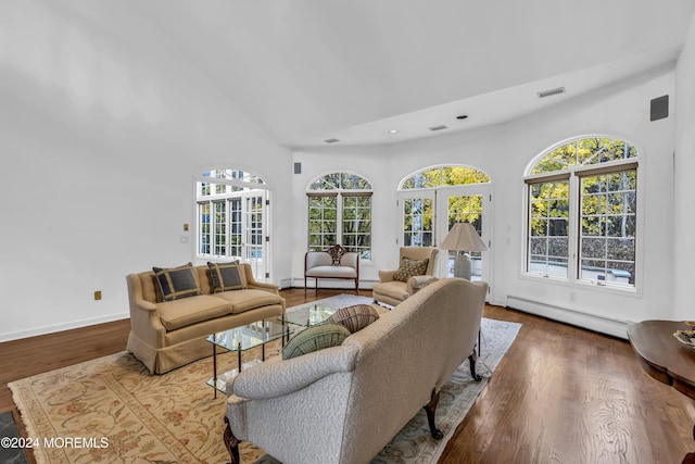 34 Bruns Rd, West Allenhurst, NJ 07711 - living area featuring baseboard heating, wood finished floors, high vaulted ceiling, recessed lighting, and a baseboard heating unit