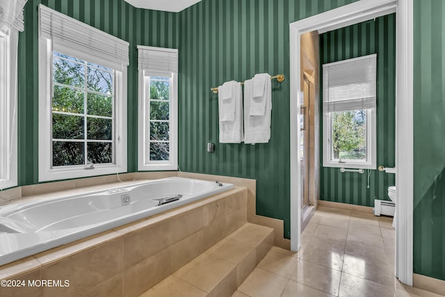 34 Bruns Rd, West Allenhurst, NJ 07711 - bathroom with a garden tub, healthy amount of natural light, a baseboard heating unit, wallpapered walls, and tile patterned flooring