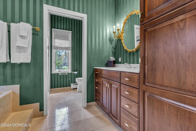 34 Bruns Rd, West Allenhurst, NJ 07711 - full bath with wallpapered walls, vanity, toilet, tile patterned floors, and baseboards