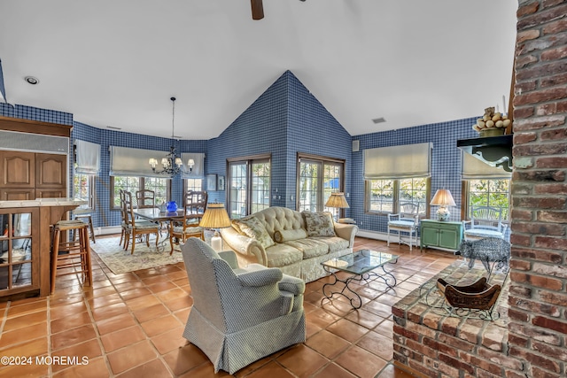 34 Bruns Rd, West Allenhurst, NJ 07711 - tiled living area with wallpapered walls, lofted ceiling, a chandelier, and ceiling fan