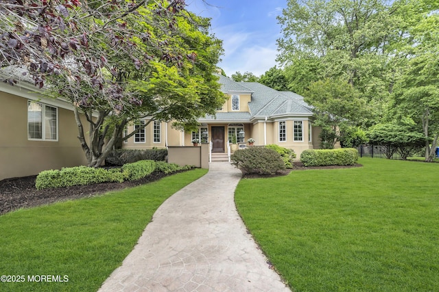 34 Bruns Rd, West Allenhurst, NJ 07711 - view of front of home with stucco siding