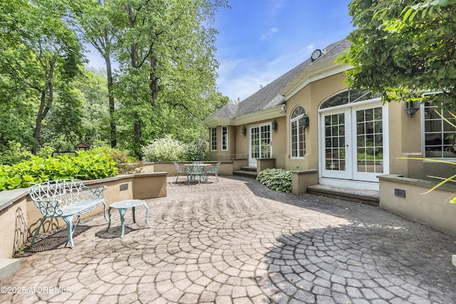 34 Bruns Rd, West Allenhurst, NJ 07711 - view of patio / terrace with french doors and outdoor dining space