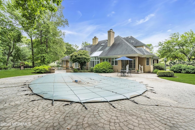 34 Bruns Rd, West Allenhurst, NJ 07711 - view of swimming pool with a patio and a covered pool
