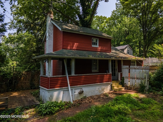 965 W Front St, Red Bank, NJ 07701 - view of front of property with a porch and a chimney
