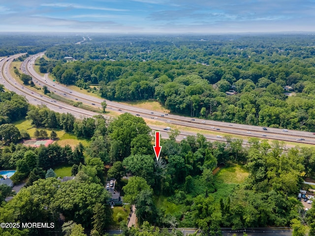 965 W Front St, Red Bank, NJ 07701 - aerial view of property and surrounding area with a major roadway and a forest