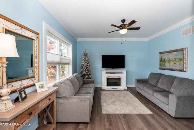 1608 Champlain St, Toms River, NJ 08757 - living room with crown molding, a ceiling fan, wood finished floors, baseboards, and a fireplace with raised hearth