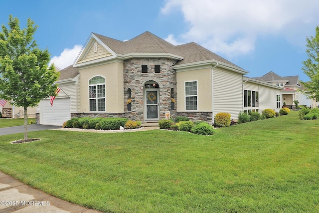 46 Rockland St, Barnegat, NJ 08005 - view of front of home with stone siding, a garage, asphalt driveway, a front lawn, and stucco siding