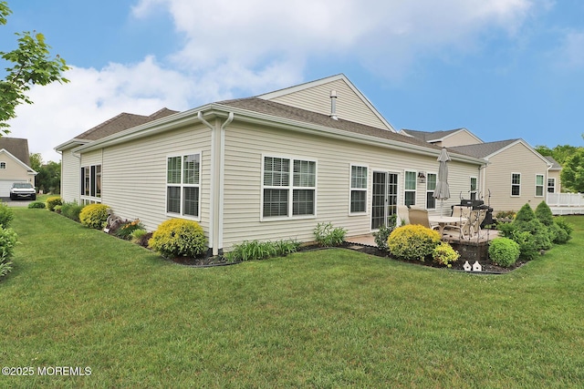 46 Rockland St, Barnegat, NJ 08005 - rear view of house featuring a lawn and a patio area
