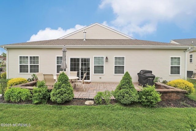 46 Rockland St, Barnegat, NJ 08005 - rear view of property with a patio, a lawn, and central AC unit