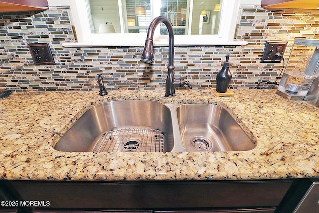46 Rockland St, Barnegat, NJ 08005 - kitchen view of a sink, tasteful backsplash, and light stone counters