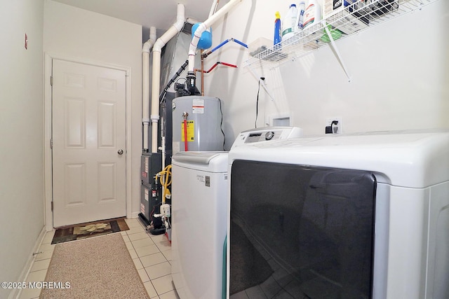 46 Rockland St, Barnegat, NJ 08005 - laundry room featuring independent washer and dryer, water heater, and light tile patterned flooring
