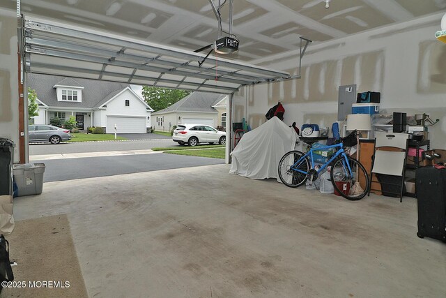 46 Rockland St, Barnegat, NJ 08005 - garage with a garage door opener and electric panel