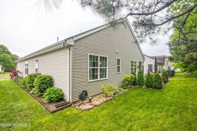 85 Briarwood Dr, Little Egg Harbor, NJ 08087 - view of side of property featuring a lawn and central AC unit
