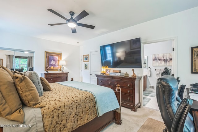 85 Briarwood Dr, Little Egg Harbor, NJ 08087 - bedroom featuring light colored carpet, ceiling fan, and ensuite bathroom