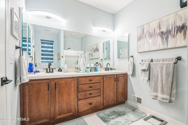 85 Briarwood Dr, Little Egg Harbor, NJ 08087 - bathroom with double vanity, baseboards, and an enclosed shower
