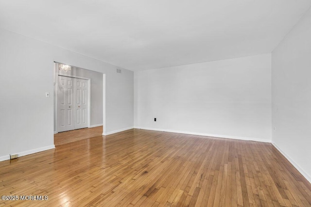 25 Overhill Rd, Ocean Twp, NJ 07712 - empty room with light wood-style flooring and baseboards