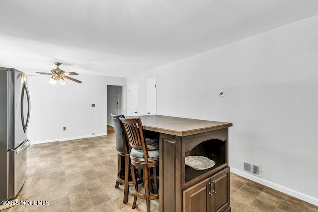 25 Overhill Rd, Ocean Twp, NJ 07712 - dining room with a ceiling fan and baseboards