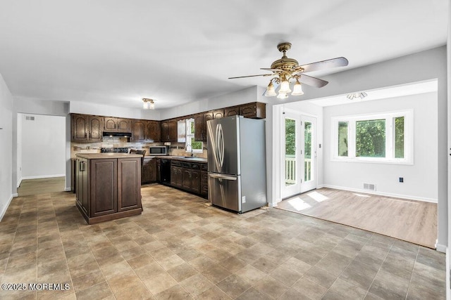 25 Overhill Rd, Ocean Twp, NJ 07712 - kitchen featuring appliances with stainless steel finishes, dark brown cabinets, a ceiling fan, and healthy amount of natural light