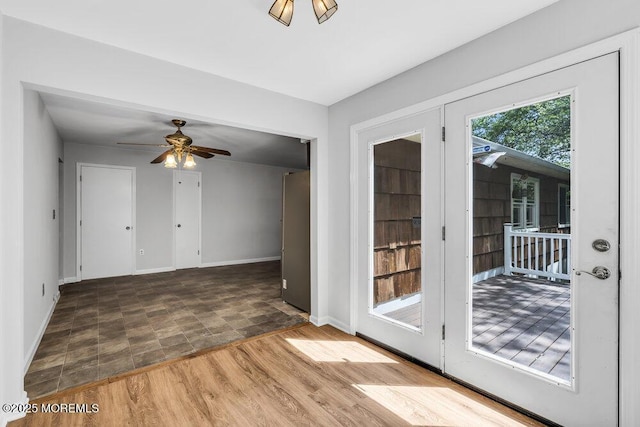25 Overhill Rd, Ocean Twp, NJ 07712 - spare room featuring stone finish floors, a ceiling fan, and baseboards