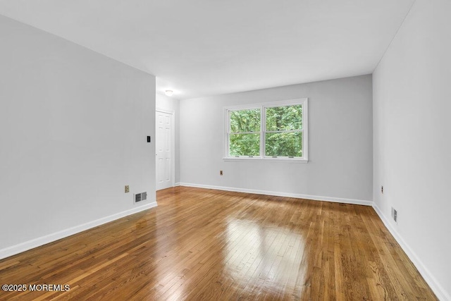 25 Overhill Rd, Ocean Twp, NJ 07712 - unfurnished room featuring hardwood / wood-style floors and baseboards