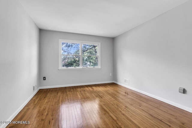 25 Overhill Rd, Ocean Twp, NJ 07712 - spare room with hardwood / wood-style flooring and baseboards