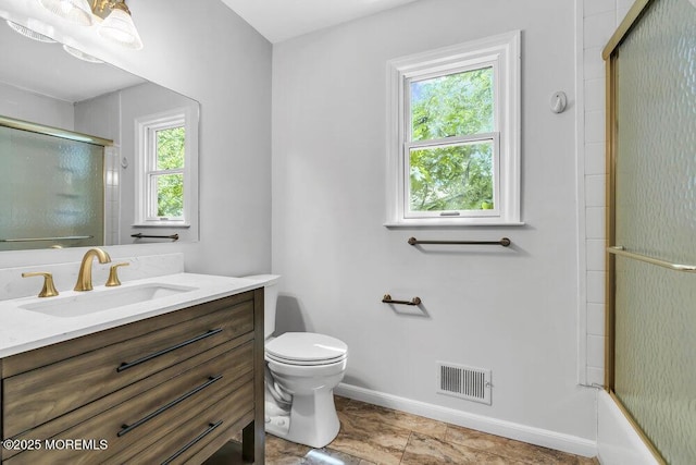 25 Overhill Rd, Ocean Twp, NJ 07712 - bathroom with toilet, vanity, baseboards, and bath / shower combo with glass door