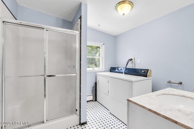 25 Overhill Rd, Ocean Twp, NJ 07712 - bathroom with a baseboard radiator, a shower stall, washer and clothes dryer, and tile patterned floors