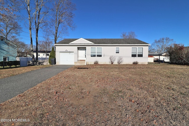 406 River Ter, Toms River, NJ 08755 - view of front of home with an attached garage, asphalt driveway, and a shingled roof