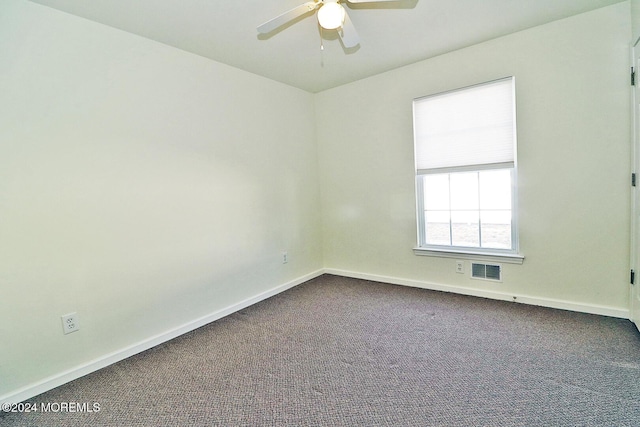 406 River Ter, Toms River, NJ 08755 - unfurnished room with ceiling fan, dark colored carpet, and baseboards