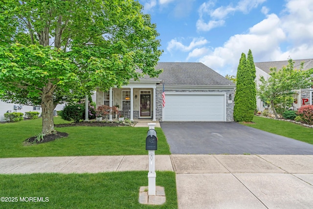 5 Minot Light Ct, Barnegat, NJ 08005 - obstructed view of property featuring stone siding, driveway, a garage, and a front lawn