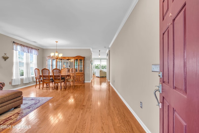 5 Minot Light Ct, Barnegat, NJ 08005 - entrance foyer with a chandelier, ornamental molding, light wood-type flooring, and baseboards