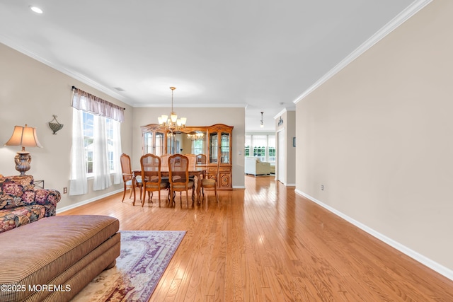 5 Minot Light Ct, Barnegat, NJ 08005 - living area with a chandelier, light wood finished floors, baseboards, and crown molding