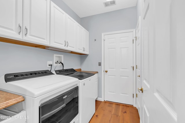 5 Minot Light Ct, Barnegat, NJ 08005 - laundry area featuring cabinet space, separate washer and dryer, and light wood-style flooring