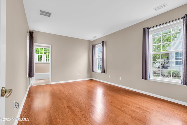 5 Minot Light Ct, Barnegat, NJ 08005 - spare room with light wood-style flooring and baseboards