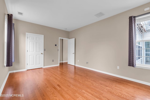 5 Minot Light Ct, Barnegat, NJ 08005 - unfurnished bedroom with light wood-style floors and baseboards
