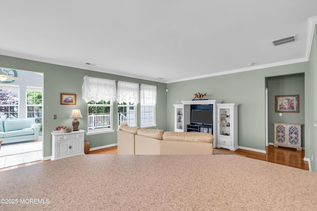 5 Minot Light Ct, Barnegat, NJ 08005 - living room featuring ornamental molding, baseboards, and wood finished floors