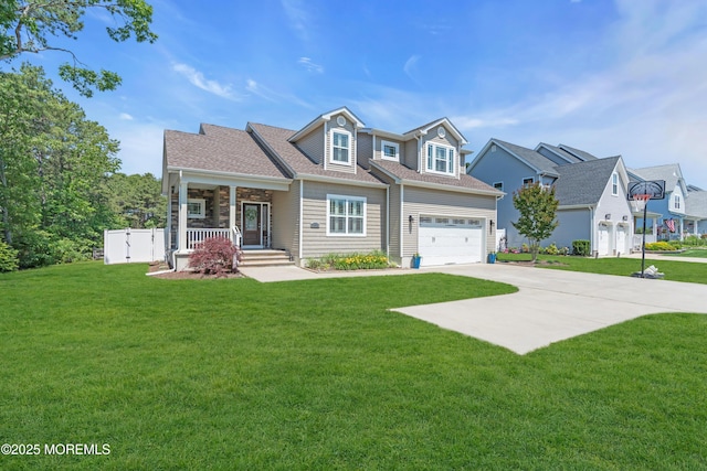 342 Old Squan Rd, Brick, NJ 08724 - view of front of property with driveway, a front lawn, covered porch, and a garage