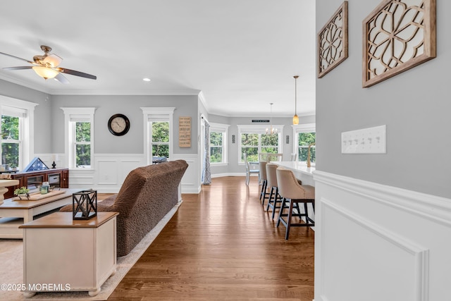 342 Old Squan Rd, Brick, NJ 08724 - living area featuring ceiling fan, wood finished floors, ornamental molding, recessed lighting, and a wainscoted wall