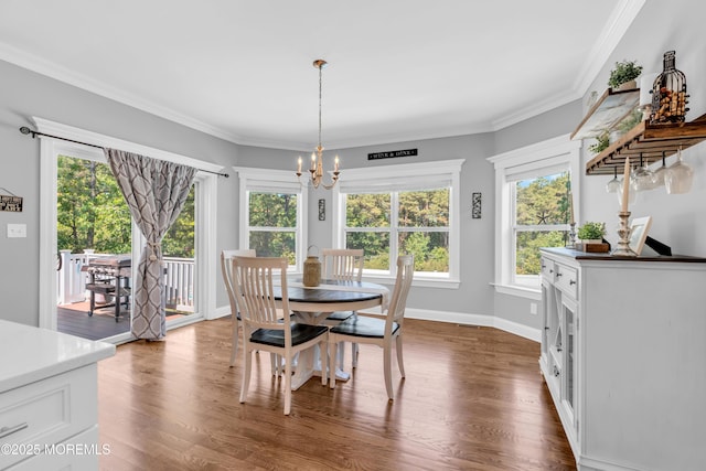 342 Old Squan Rd, Brick, NJ 08724 - dining area with a chandelier, dark wood-style floors, ornamental molding, and baseboards
