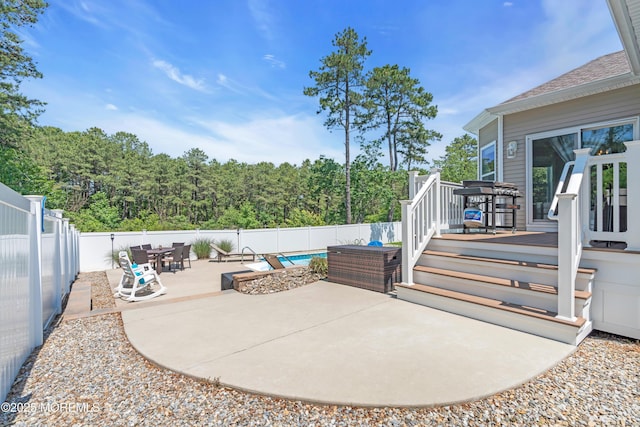 342 Old Squan Rd, Brick, NJ 08724 - fenced backyard with a deck, a patio area, and outdoor dining area