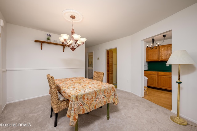 21 Pine Cluster Cir Unit A, Manalapan, NJ 07726 - dining space with a chandelier, light carpet, and baseboards