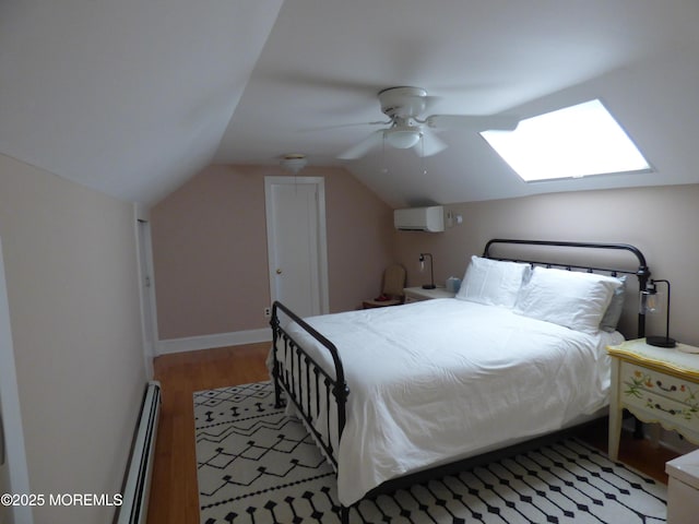 91 Center Ave, Atlantic Highlands, NJ 07716 - bedroom featuring a baseboard radiator, an AC wall unit, light wood-style flooring, lofted ceiling, and a skylight