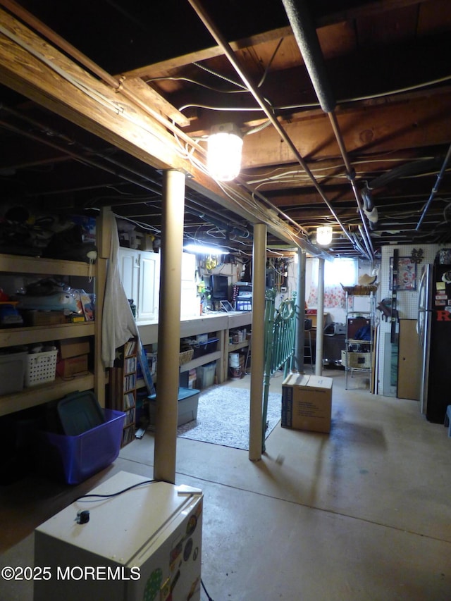 91 Center Ave, Atlantic Highlands, NJ 07716 - unfinished basement with freestanding refrigerator