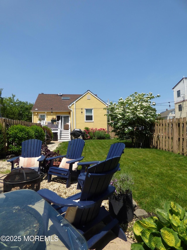 91 Center Ave, Atlantic Highlands, NJ 07716 - view of yard with a fire pit and a wooden deck