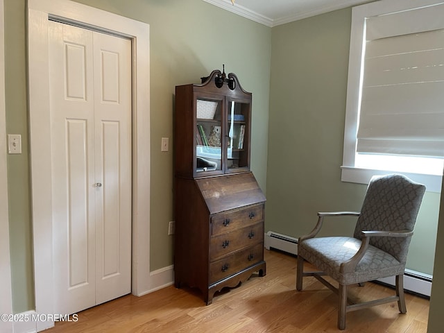 91 Center Ave, Atlantic Highlands, NJ 07716 - living area with a baseboard radiator, light wood finished floors, and ornamental molding